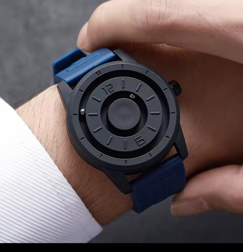 Blue magnetic suspension men's watch worn on wrist