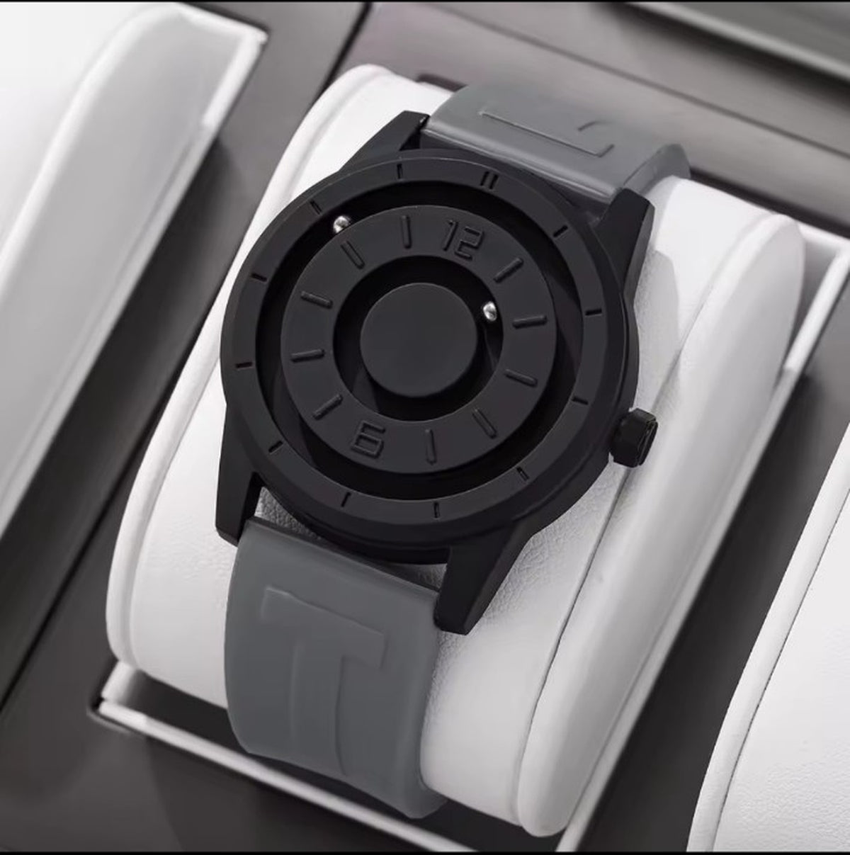 Grey magnetic suspension men's watch close-up